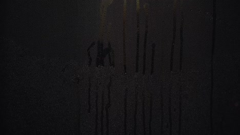 condensation on a window at night