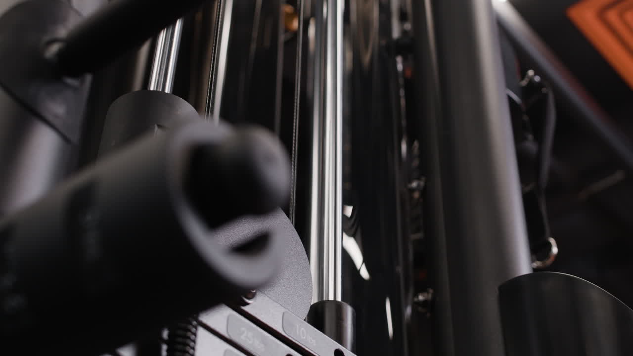 Close-up view of gym weight machine