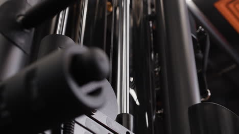 Close-up view of gym weight machine