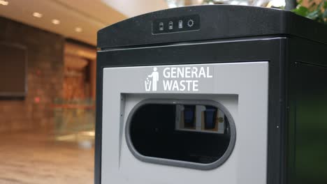 public trash can in a shopping mall