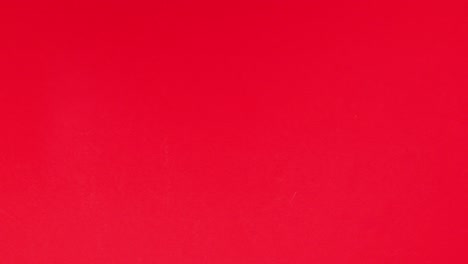 los renos de navidad y santa claus aparecen en el lado izquierdo en el tema rojo.