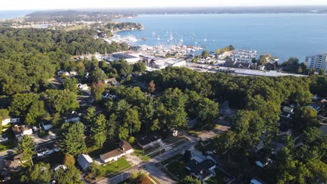 pushing in with drone toward a marina on muskegon lake