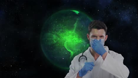 Animation-of-globe-over-caucasian-male-doctor-wearing-face-mask