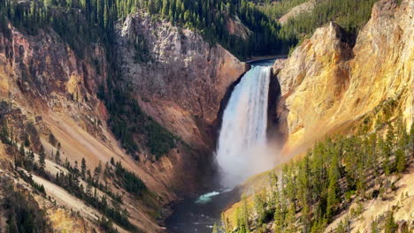 waterfall grand canyon of the yellowstone national park river upper lower falls hdr lookout artist point autumn canyon village lodge roadway stunning daytime landscape view cinematic pan up slowly