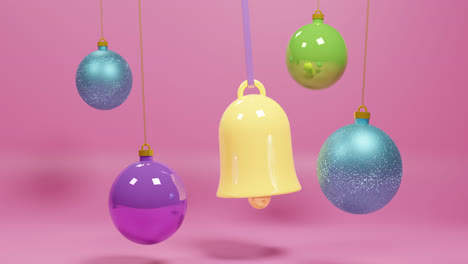 animation of christmas decorations over pink background