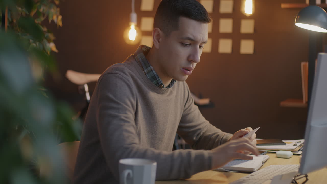 Man paying bills online