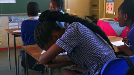 schoolgirl crying in a lesson at a township school 4k