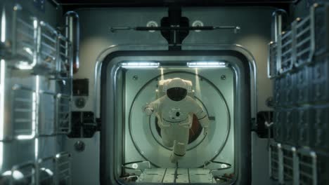 astronaut inside the orbital space station