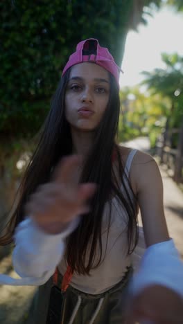 teenage girl posing outdoors