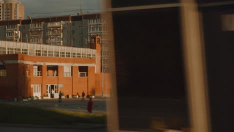 cityscape at sunset with people