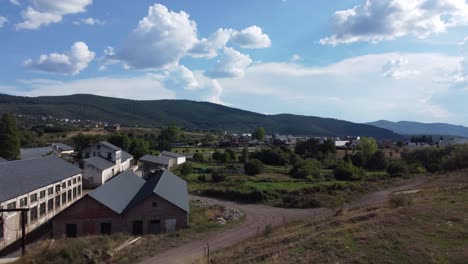 Ancient-mine-tower-and-buildings-of-an-underground-coal-mine-called-Pozo-Viejo-in-Fabero-Aerial-view-3