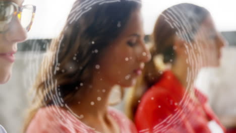 animation of scope scanning over businesswomen