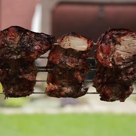 grilling steaks with flames