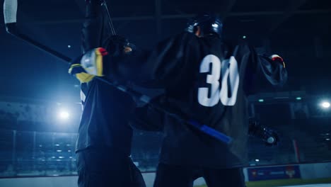 ice hockey rink arena: professional forward player celebrating goal, raising hands, shouting happily, team members hug him, happy athletes winning championship. cinematic slow motion handheld shot