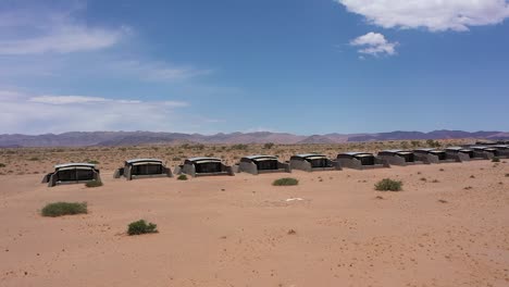 aerial view of a few lodges in the namibian desert close to sossusvlei