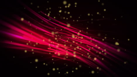 animation of yellow spots over glowing red light trails against black background with copy space