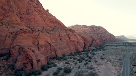 High-angle-aerial-view-of-snow-canyon-landscape-during-sunny-day-outdoors-in-wilderness