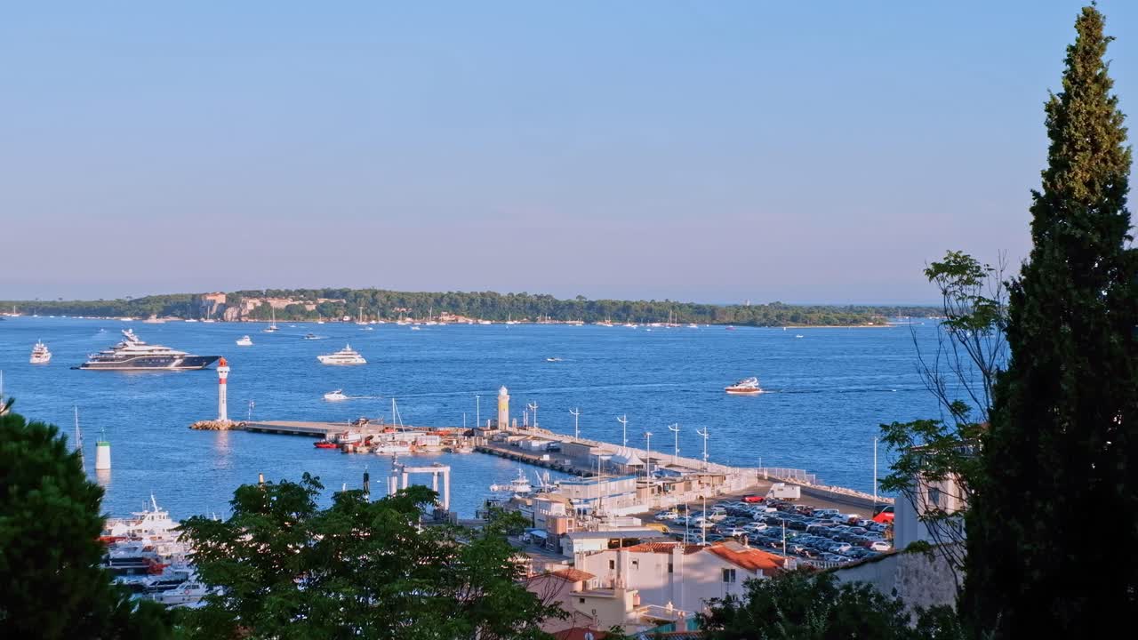 Scenic view of the bay of Cannes from a balcony in sunset, France