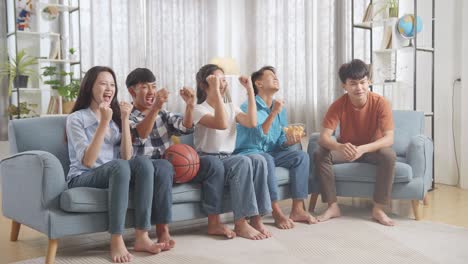 friends watching basketball game