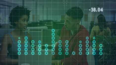 Animation of statistical data processing over diverse man and woman discussing over laptop at office