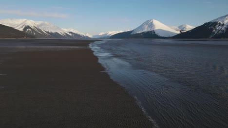 aerial shot of the bore tide coming in on alaska's turnagain arm