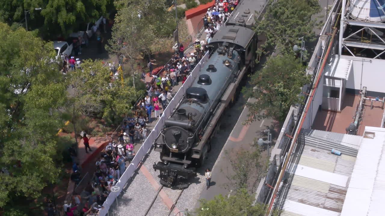 Aerial View of a Crowd Watching a Historic Steam Train