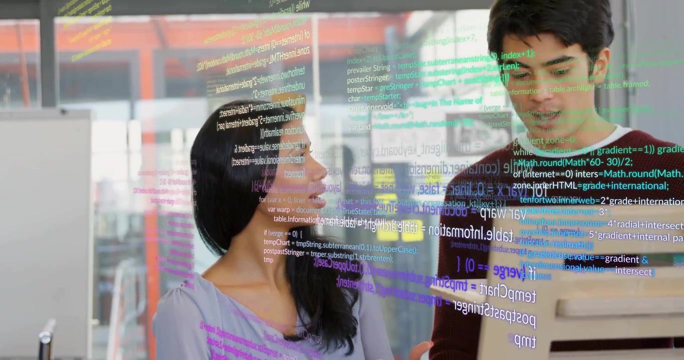 woman gesturing at screen initiating code overlay for code review while male colleague leaning in