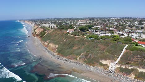 aerial shot of seafront houses on a cliff in encinitas california, usa