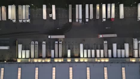 night aerial view of a warehouse of goods for online stores