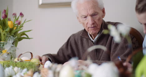 happy easter grandfather and granddaughter writing easter cards with greetings 5