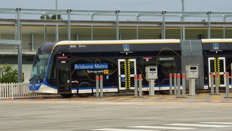 electric bi-articulated vehicle, metro bus parked at the off-peak slow charging station in rochedale depot, innovative bus rapid transit system in queensland.