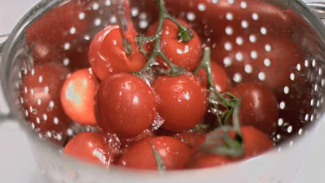 tomatoes being washed in super slow motion