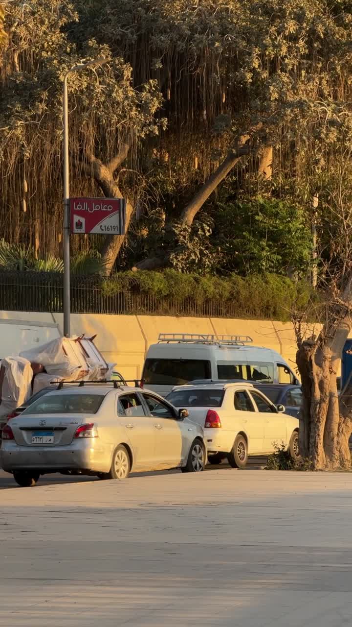 A view of a road full of cars, trucking shot