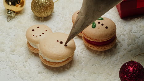 decorated snowman macarons