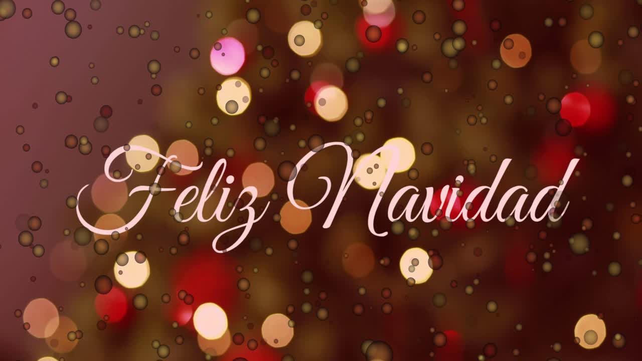 Animación de puntos de luz amarillos y una pancarta con el texto «Feliz Navidad» sobre un árbol de Navidad decorado.