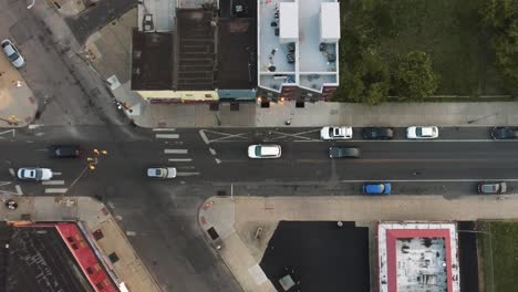 north philadelphia intersection drone during dusk with cars going by