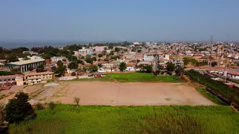 Establishing-Aerial-Panorama-Drone-Fly-Above-Banjul-City-Capital-of-The-Gambia,-Commemorative-Arch-22