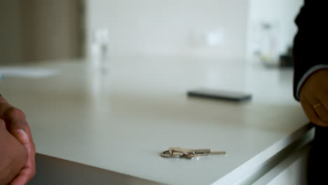 man shaking hands with real estate agent