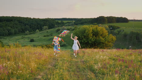 Happy-Mom-And-Daughter-Play-Emotionally-With-An-Air-Kite-Run-Through-A-Scenic-Spot-Steadicam-Shot