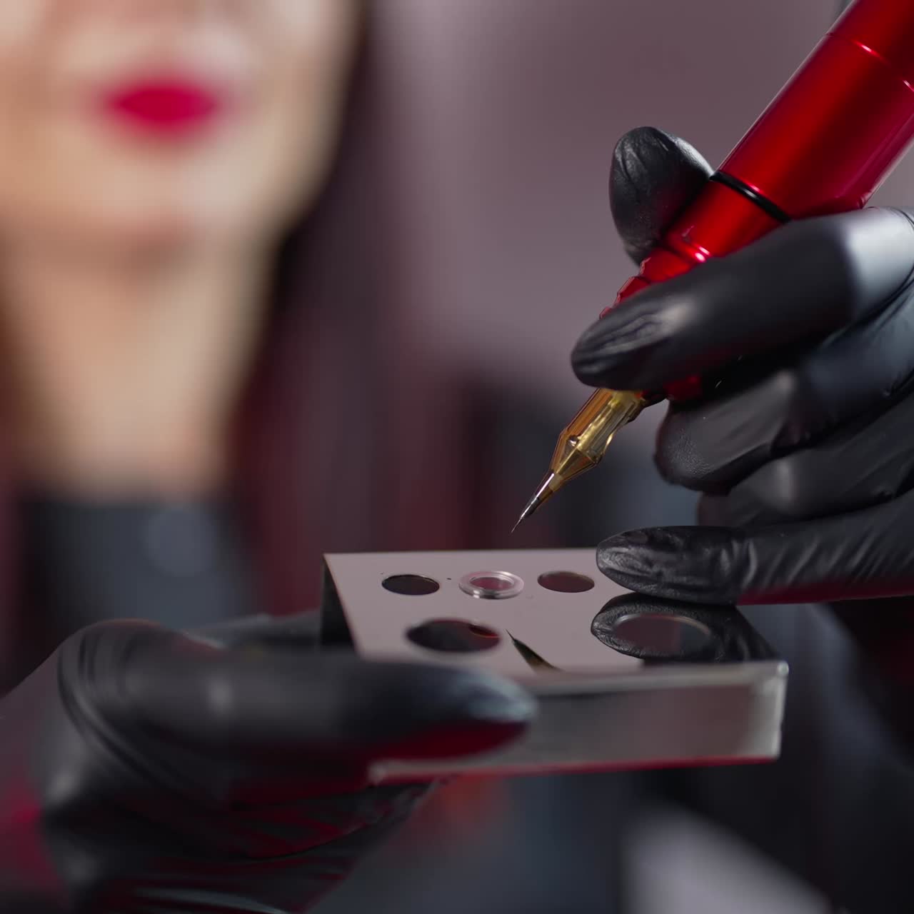 Preparing before permanent makeup. Preparation of the needle before the eyebrow tattoo