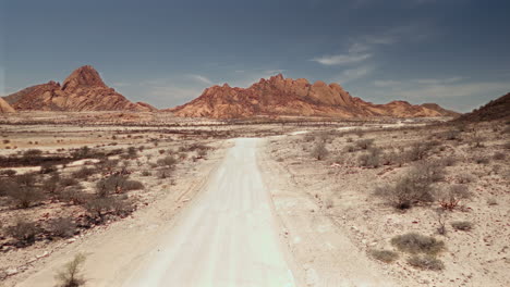 desert road through mountains