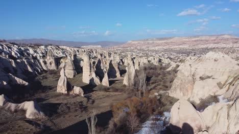 cappadocia's fairy chimneys: geological pillar rock formations formed by erosion