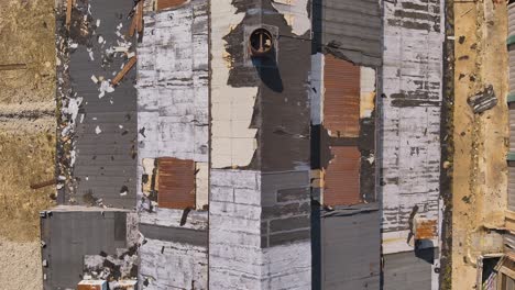 an abandoned ware house in cleveland, ohio flying over the rooftop