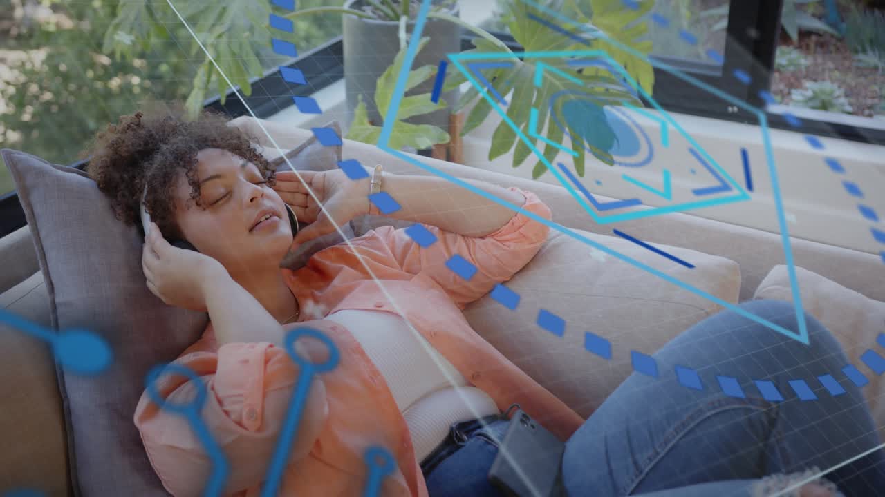 Woman reclining sofa, tapping smartphone and activating blue AR overlays while exploring music app