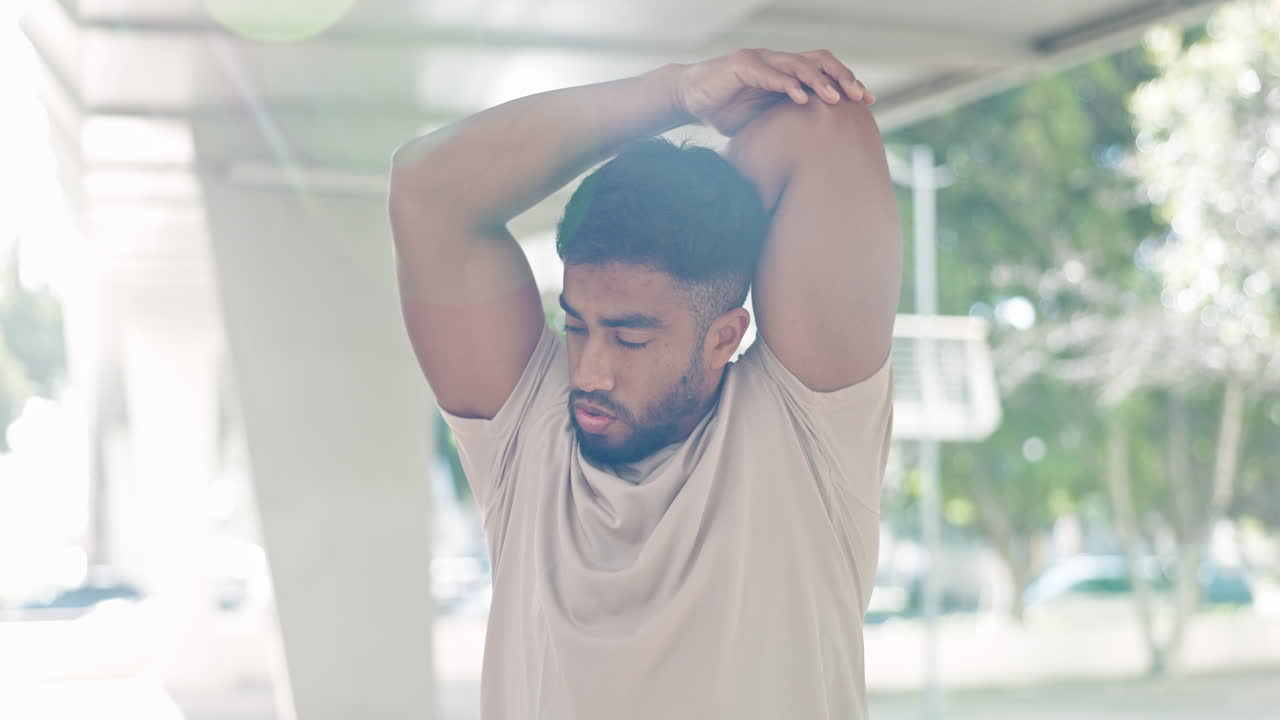 Man, outdoor and stretching arms for fitness