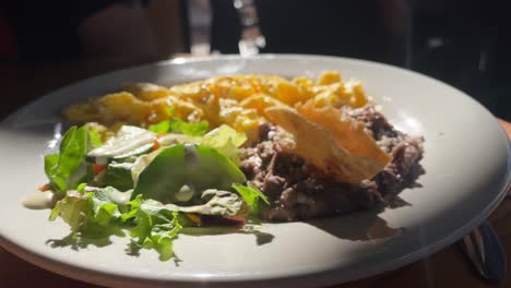 continental-breakfast-served-on-white-plate-at-bar-cafe-restaurant