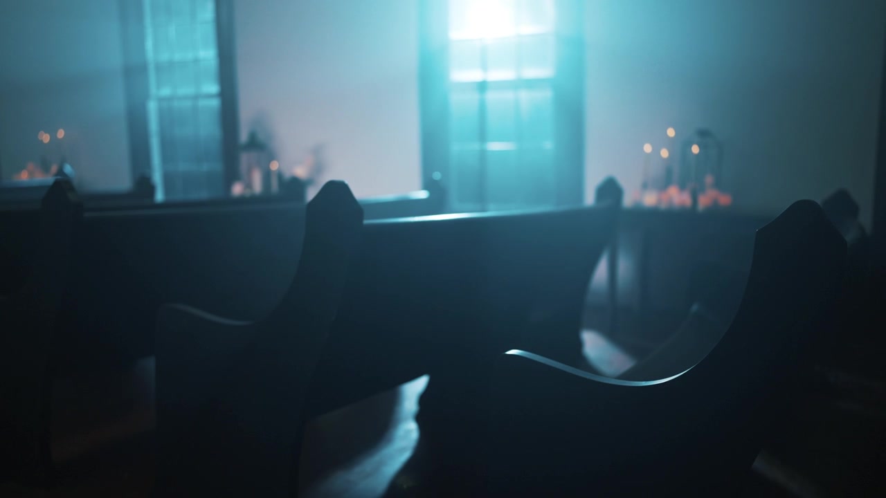 Eerie Blue Light Illuminates Empty Church Pews