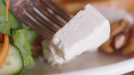 healthy salad with cheese and walnuts