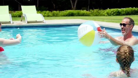 family enjoying in swimming pool