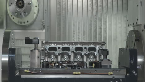 industrial factory machinery and equipment assembly line with advanced high precision robot arm inside bright electronics plant intricate components in a modern manufacturing facility